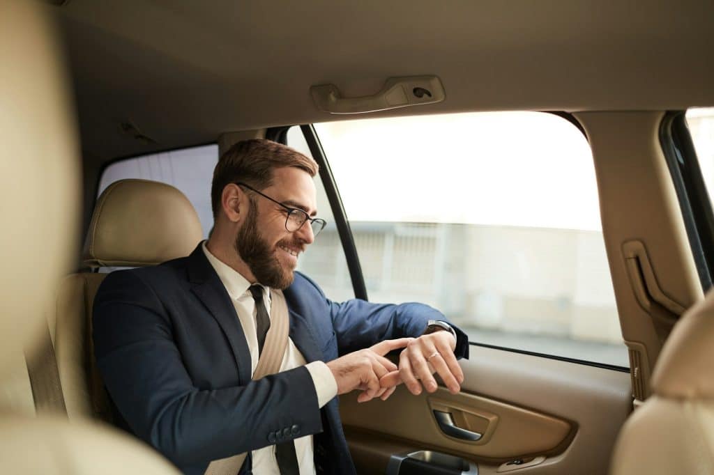 Businessman travelling by taxi